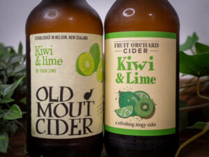 A bottle of Old mout kiwi and lime flavoured cider next to Lidl's Kiwi and Lime cider comparison.