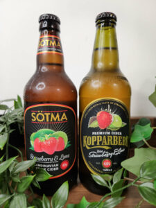 Lidl's Sotma Strawberry and Lime cider next to Kopparberg strawberry and lime bottle.